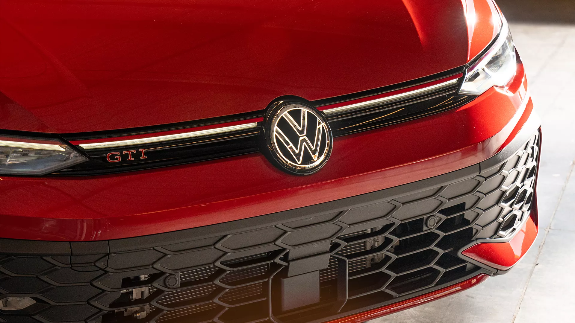 2026 VW Golf GTI Front grille-integrated light bar and illuminated VW logo 